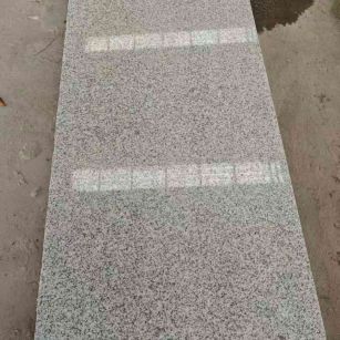 固原芝麻白光面毛板