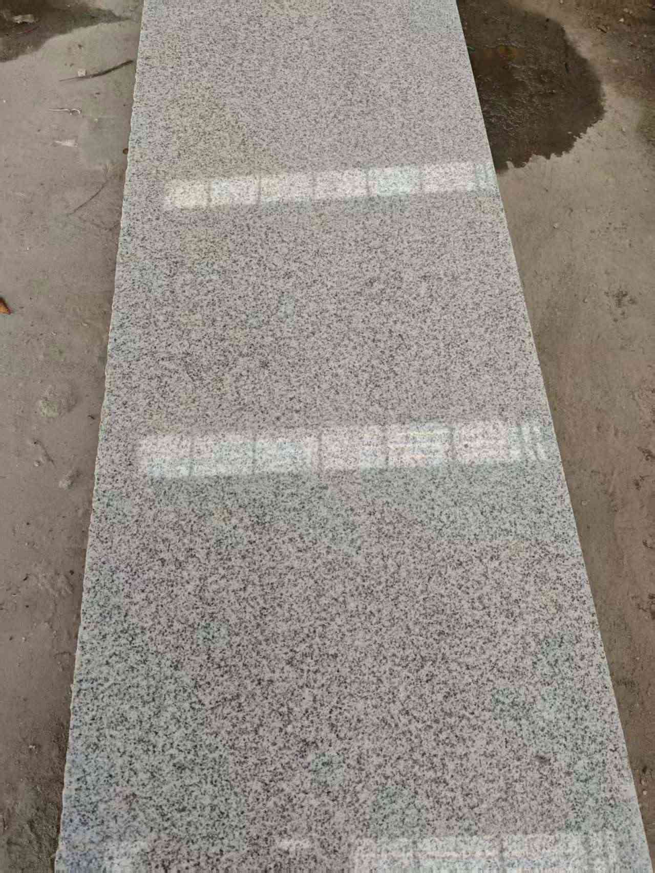 固原芝麻白光面毛板